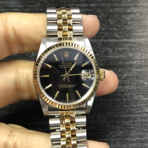 Rolex Datejust 31 Steel and Yellow Gold / Fluted / Champagne Index / Jubilee 69173