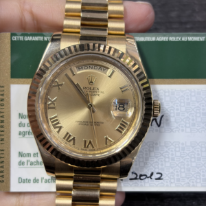 Rolex Day-Date II Yellow Gold Fluted Champagne Roman 218238-0038