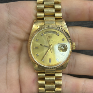 Rolex Day-Date 36 Yellow Gold / Fluted / Champagne Index / President 18038