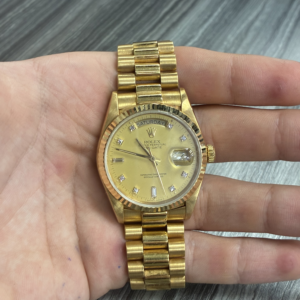 Rolex Day-Date 36 Yellow Gold / Fluted / Champagne Index / President 18038