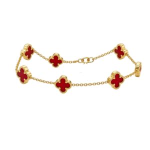 Elegant 14k Gold Vancliff Bracelet with striking red accents, a luxurious statement piece.